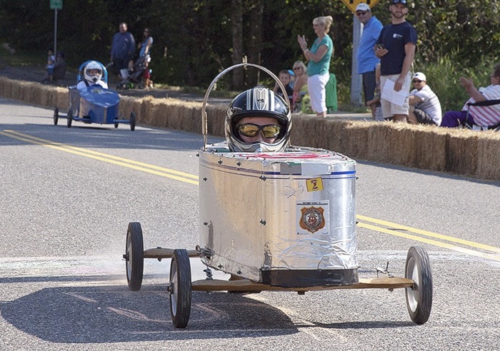 Gage Mack crosses the finish line Saturday at the 2014 Mission Soapbox Derby.