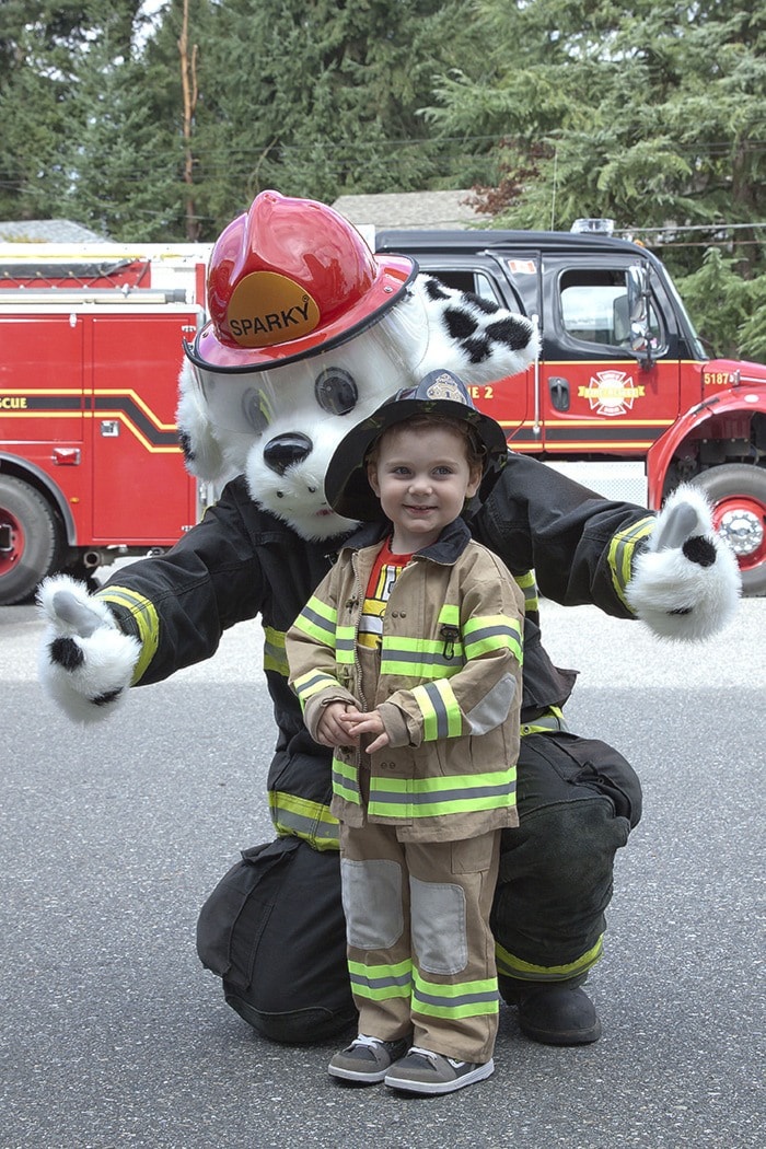 Cruz Hoy meets Sparky at the Mission Fire and Life Satety Fair on Oct. 5.