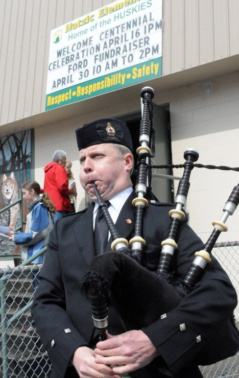 Piper Jamie McGrath welcomes visitors and dignitaries to event. JOHN MORROW