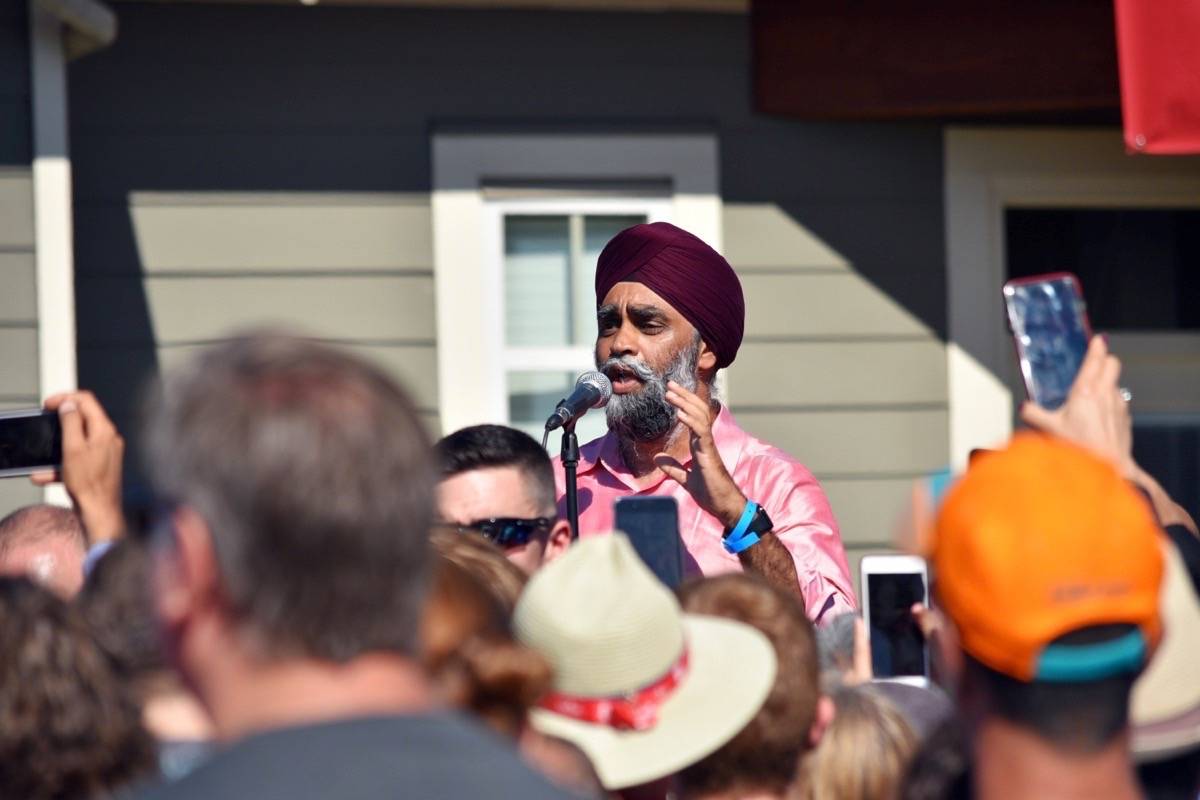 13020758_web1_180805-NDR-M-Trudeau-in-Delta-Harjit-Sajjan-intro