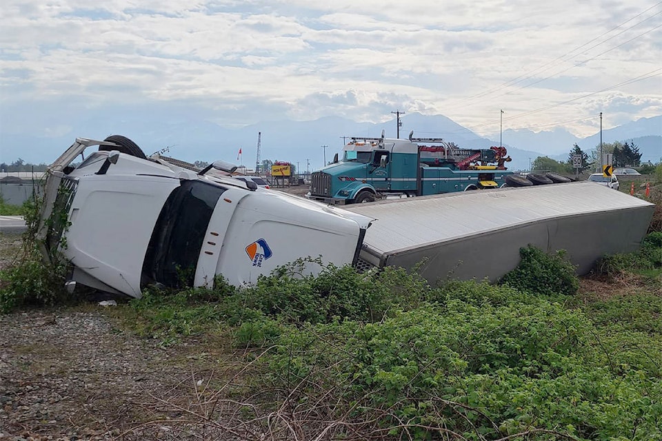 A refrigerated truck and trailer full of blueberries overturned on Industrial Way near the CN rail line and Progress Way in Chilliwack in the morning on April 23, 2021. (Paul Henderson/ Chilliwack Progress)