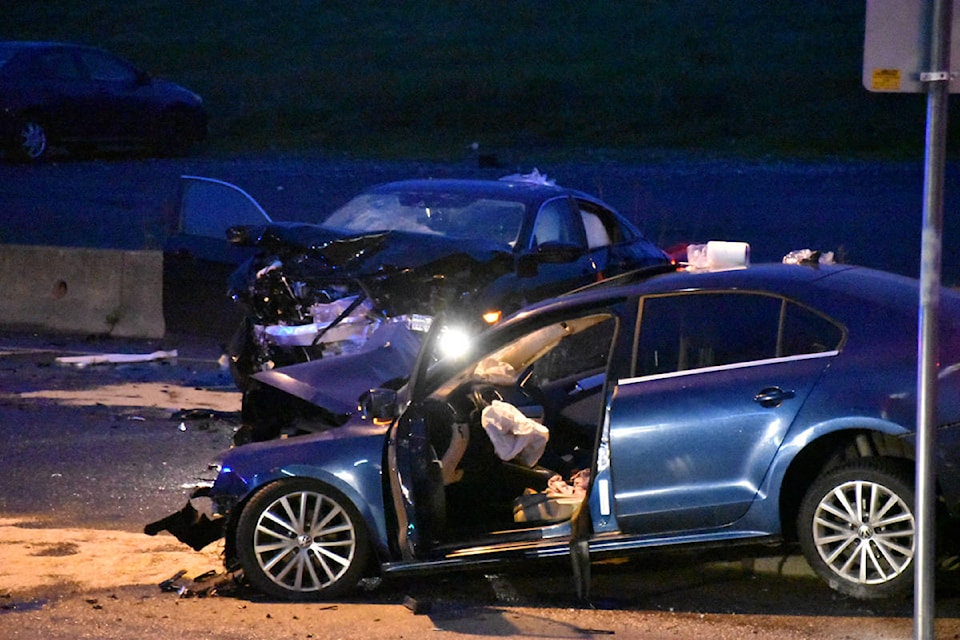 Two vehicles collided head-on Monday night (May 24) on North Parallel Road, with both suffering severe front-end damage. (Curtis Kreklau / South Fraser News Service)