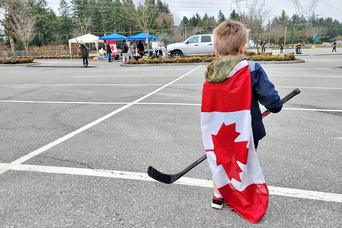 Ottawa convoy participant John Bancroft organized a potluck barbecue and some parking lot hockey games for kids on Saturday, Feb. 26, at the George Preston rec centre. (Dan Ferguson/Langley Advance Times)