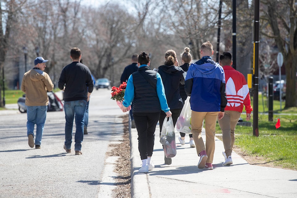 28965796_web1_220429-CPW-Four-cadets-dead-Military-College-Kingston-flowers_1