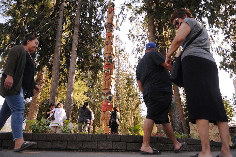 This totem pole was rededicated to the late Chief Richard Malloway outside the Cultus Lake Park Board office on Tuesday, Sept. 20, 2022. (Jenna Hauck/ Chilliwack Progress)