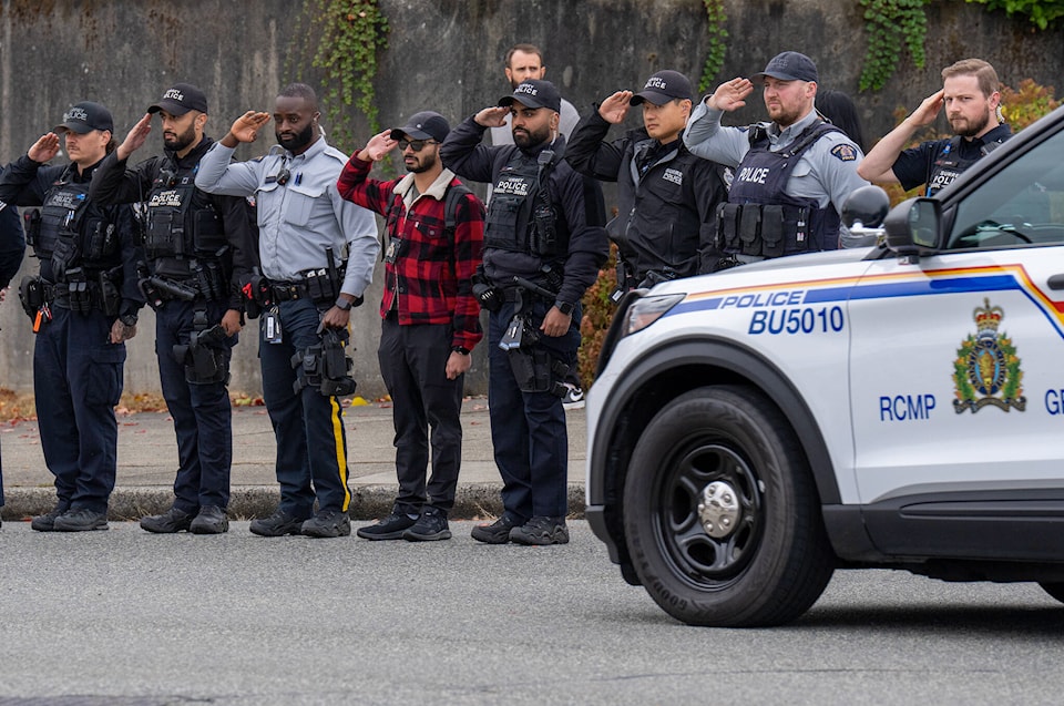 30829847_web1_221026-CPW-Shaelyn-Yang-Funeral-march-service-salute_1