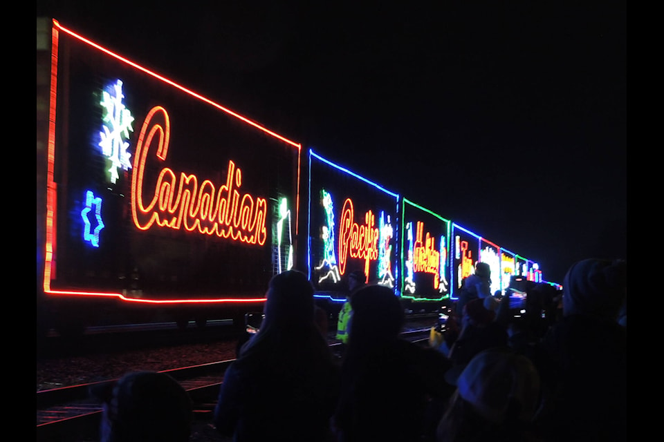 The CP Holiday Train stopped in Agassiz this weekend for the first time in three years. Hundreds of people lined the tracks to check out the holiday display on wheels. (Adam Louis/Observer)