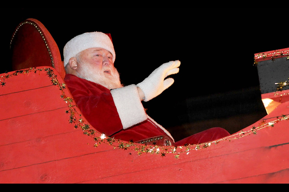 Brian Stokes is seen as Santa in a past Christmas Parade in downtown Chilliwack on Dec. 6, 2014. (Jenna Hauck/ Chilliwack Progress file)