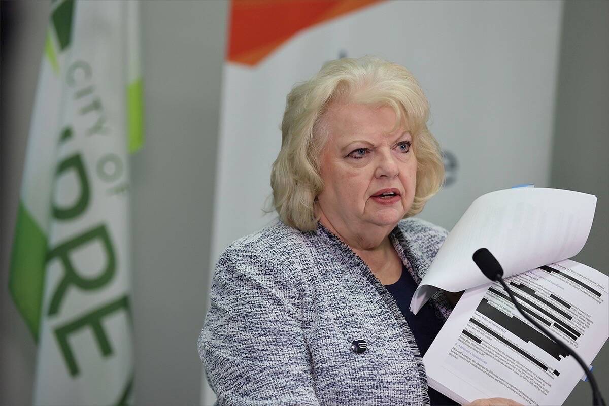 Surrey Mayor Brenda Locke with redacted NDP report. (Photo: Anna Burns)