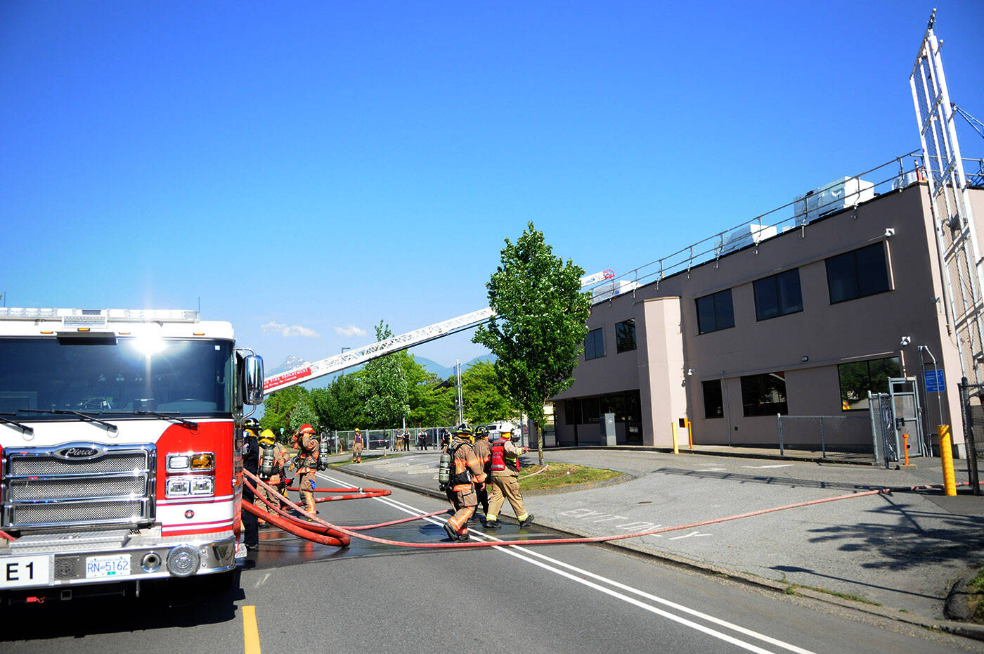 Crews with the Chilliwack Fire Department were called to a roof fire in an RCMP building on Airport Road on Friday, May 19, 2023. (Jenna Hauck/ Chilliwack Progress)