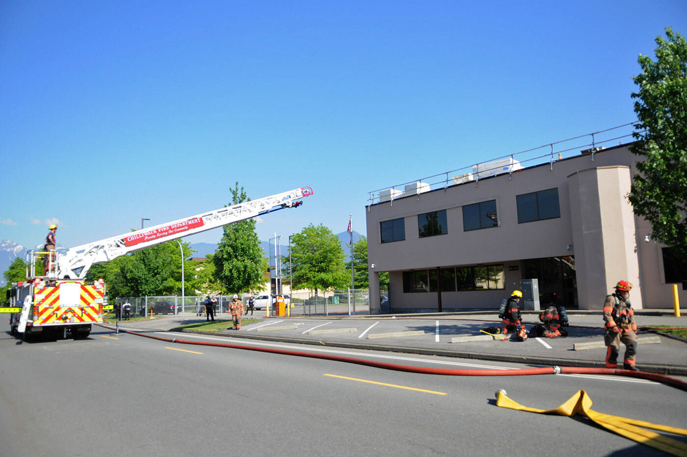 Crews with the Chilliwack Fire Department were called to a roof fire in an RCMP building on Airport Road on Friday, May 19, 2023. (Jenna Hauck/ Chilliwack Progress)