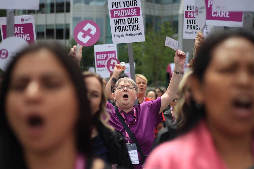Hundreds of nurses in Vancouver for a B.C. Nurses Union conference marched along the streets of Vancouver Wednesday (May 31, 2023) calling for safer staffing levels. (Lauren Collins)