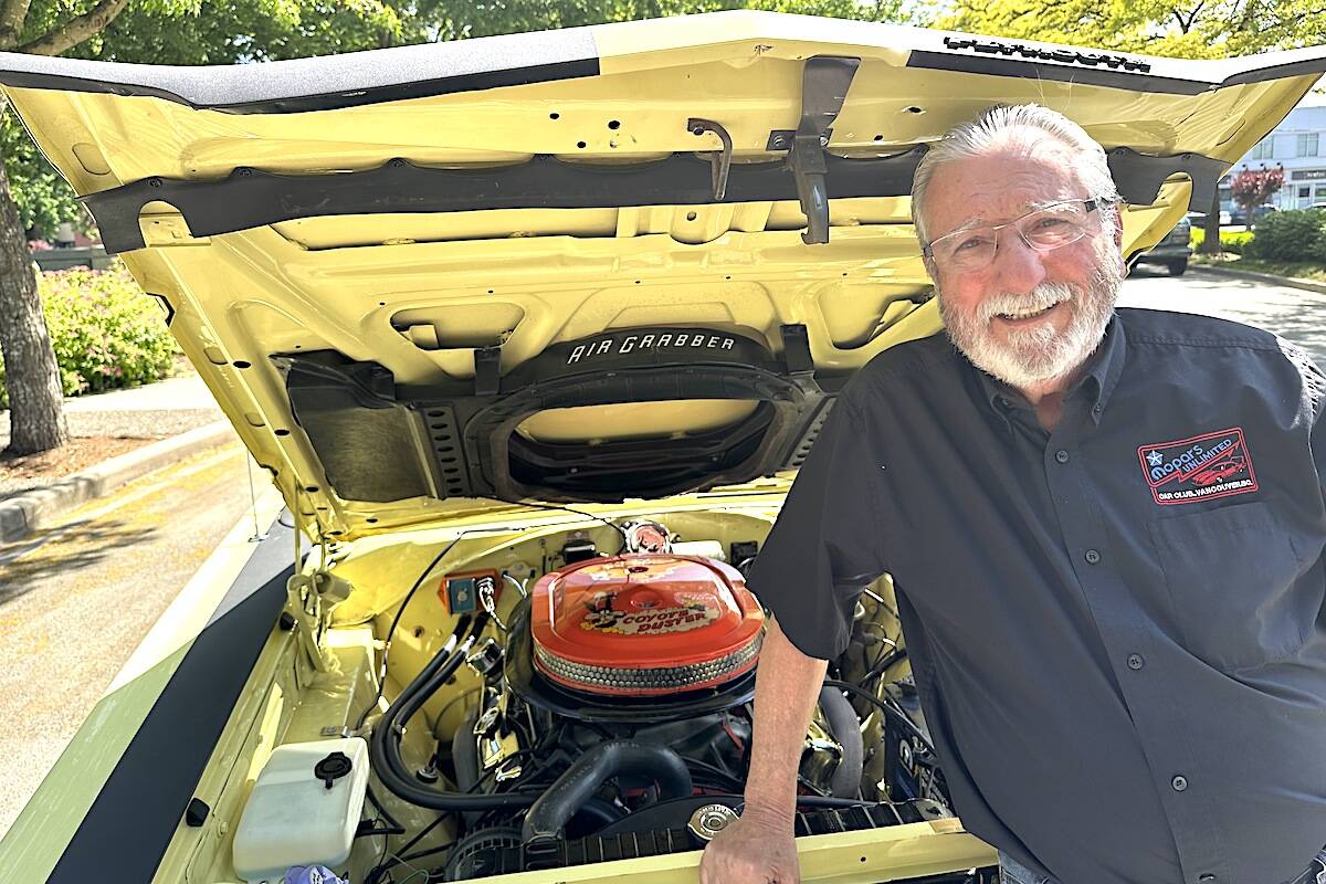 Dennis Hupka with his 1969 Plymouth Road Runner. (Jennifer Feinberg/ Chilliwack Progress)