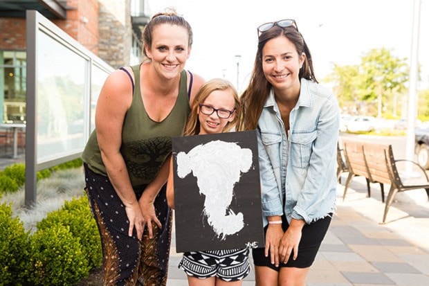 Jacob Zinn/News Staff - From left, Sarah Edwards, her daughter A