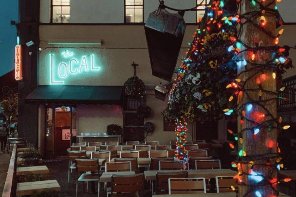 The patio at Victorias The Local adorned with Christmas lights in 2022. (Courtesy The Local Instagram)