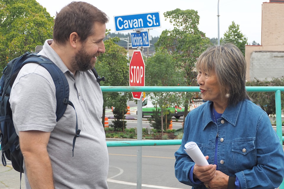 Collen Middleton, Nanaimo Area Public Safety Association president, and Gina Lum, Nob Hill Park area resident, discuss the area's social disorder issues following a press conference Friday, Aug. 16. 