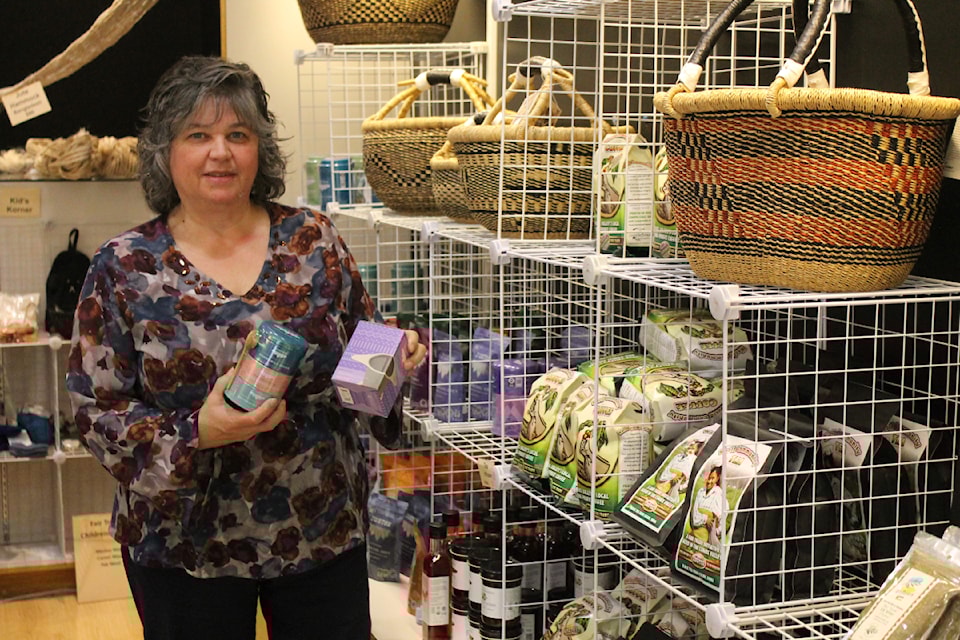 Joan Hiemstra, Global Village Nanaimo's executive director, stands by some of the teas and baskets at the spring pop-up.(Jessica Durling/News Bulletin)