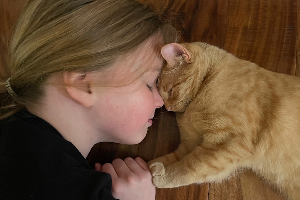 Michelle Alto's daughter Annie Alto spends time with Rosie. (Submitted photo)