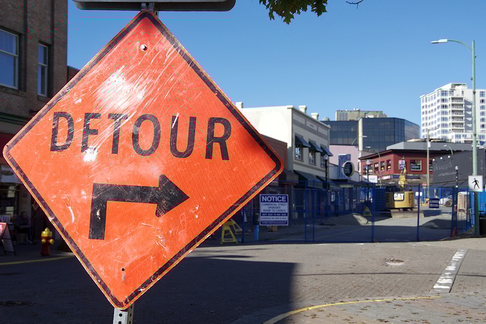 Work is paused as construction contractors move supplies and equipment to other parts of Commercial Street after a mine void was discovered under the Commercial and Bastion streets intersection in downtown Nanaimo in late September.