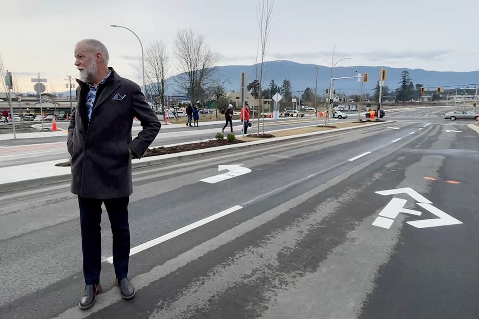 Bill Sims, Nanaimo's general manager of engineering and public works, stands on Beban Parkway, shortly after traffic lights were activated at Bowen and Boxwood roads Wednesday, Jan. 22. (Chris Bush/ News Bulletin)