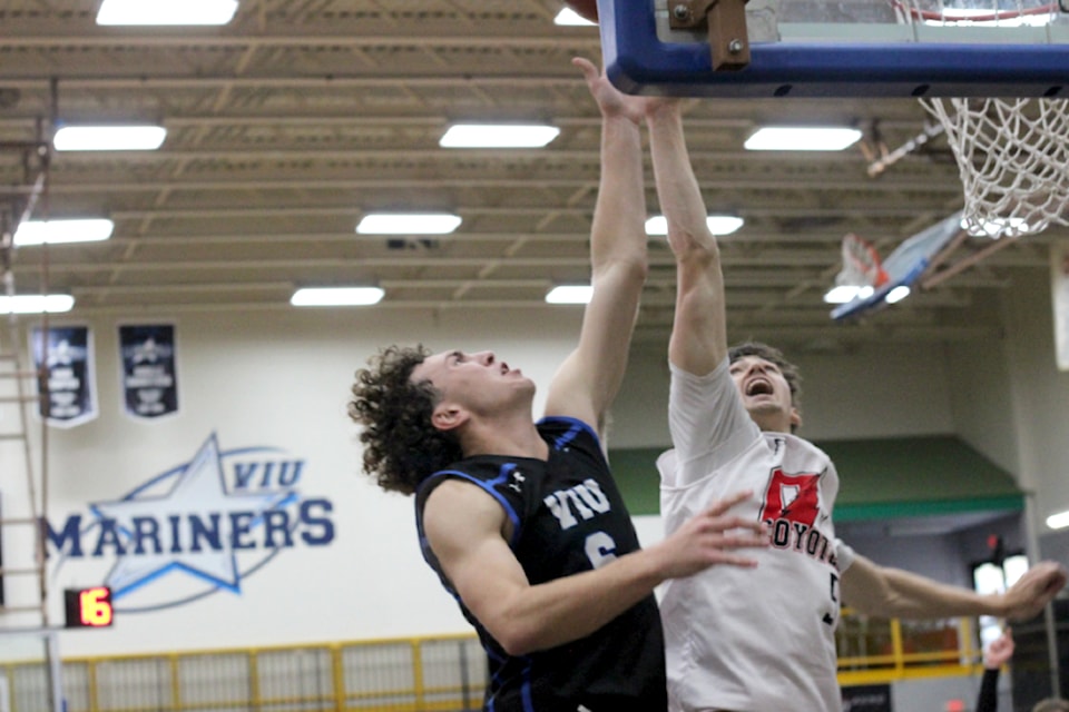 VIU Mariners player Ryan Bastian puts up a shot against the Okanagan Coyotes during PacWest play Saturday, Oct. 19, at the Vancouver Island University gym. (Greg Sakaki/News Bulletin)