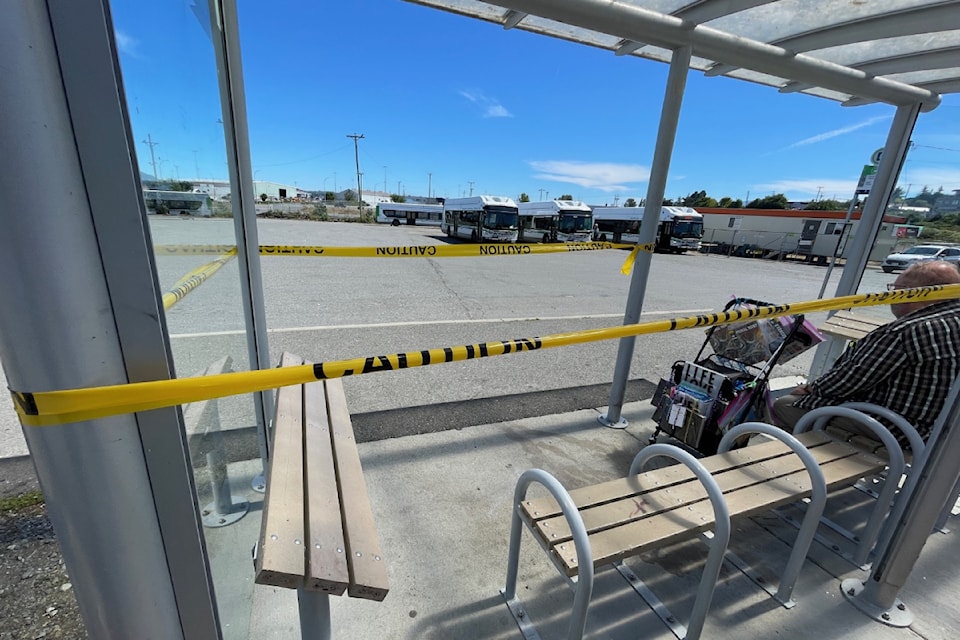 A damaged bus stop in Nanaimo, at Front Street, across the street from Port Place mall.