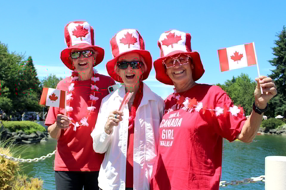 Marcia Thompson, Noreen Martin and Nancy Stern get into the Canada Day spirit Tuesday, July 1, along the Harbourfront Walkway. (Greg Sakaki/News Bulletin)