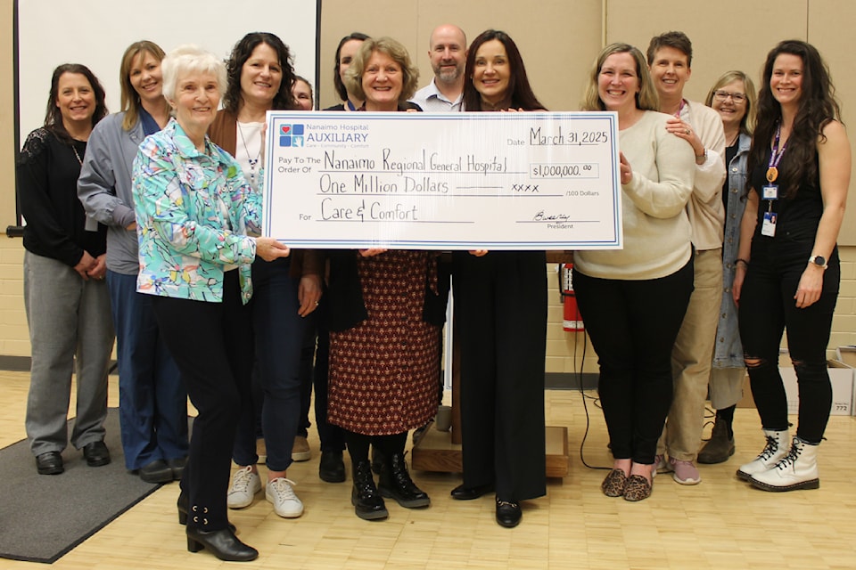 Nanaimo Hospital Auxiliary presents a cheque for $1 million to Nanaimo Regional General Hospital. (Jessica Durling/News Bulletin)