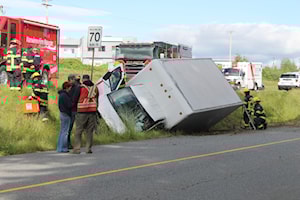 Cube van crosses centre lines of the highway and crashes in Nanaimo