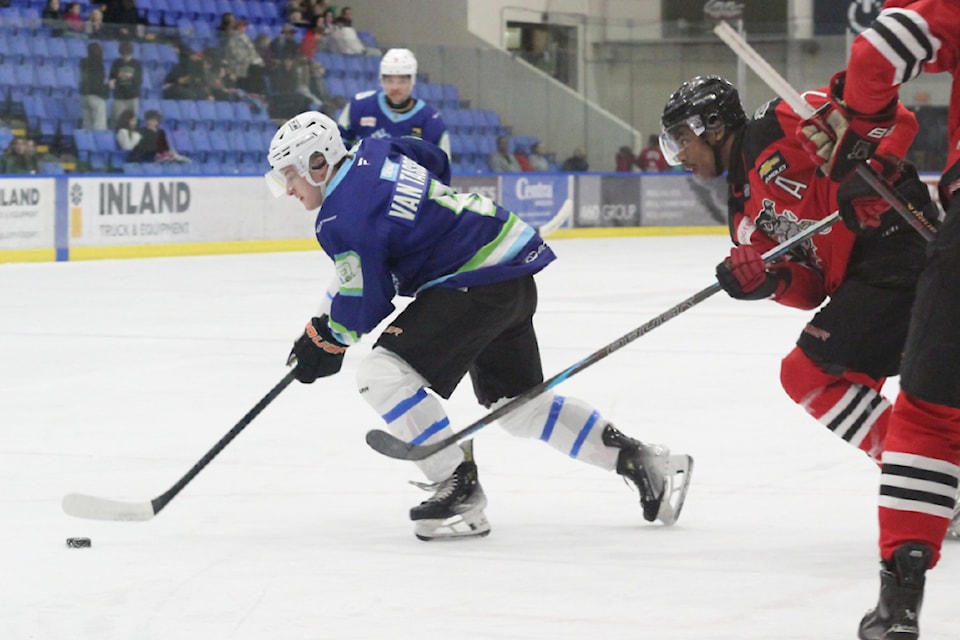 Nanaimo Clippers player Makaio Van Tassel is chased by Alberni Valley Bulldogs opponent Grayson Badger during BCHL action Friday, March 14, at Frank Crane Arena. (Greg Sakaki/News Bulletin)