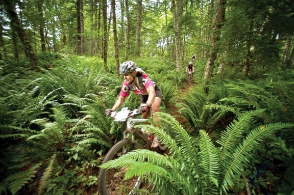 Competitors from the 2010 BC Bike Race on Expo Trail in Nanaimo on Day 1