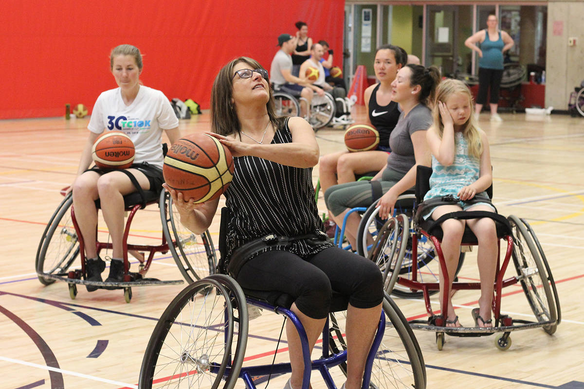 16904622_web1_190521-NBU-wheelchair-basketball-2_1