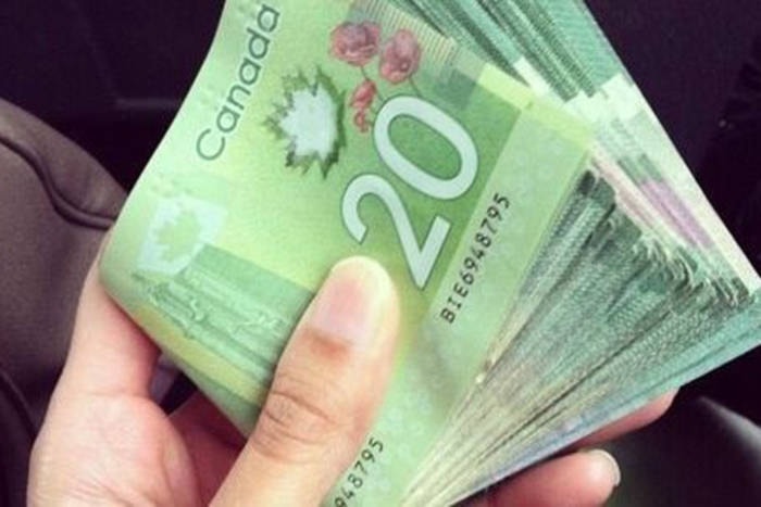 17023689_web1_190527-NBU-Canadian-cash-web