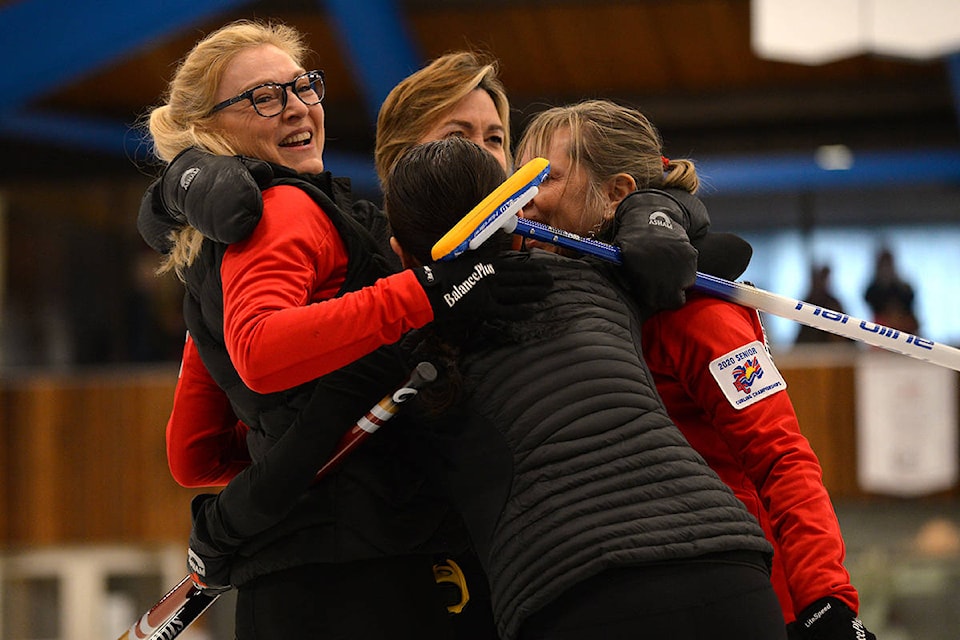 The Royal City (New Westminster)/Parksville rink of Victoria Murphy (from left), Janet Suter, Shirley Wong and Donna Mychaluk celebrate their B.C. Senior Women’s Curling Championship victory Sunday, Feb. 23, at the Vernon Curling Club. (Phil McLachlan - Black Press)