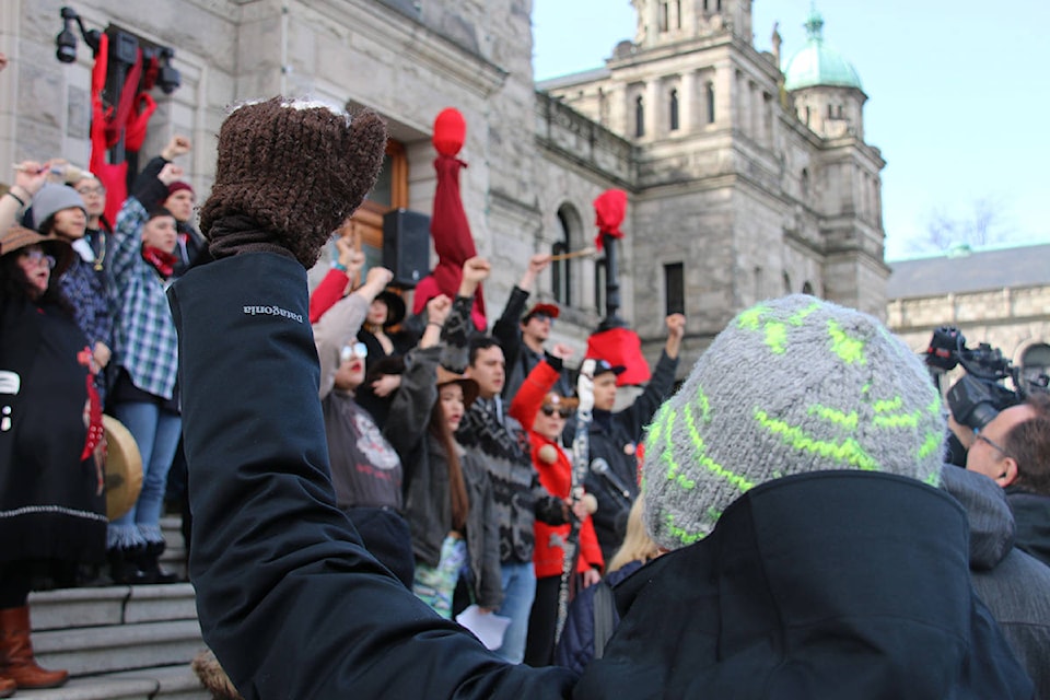 Arms raised in support of the Wet’suwet’en hereditary chiefs. (Kendra Crighton/News Staff)