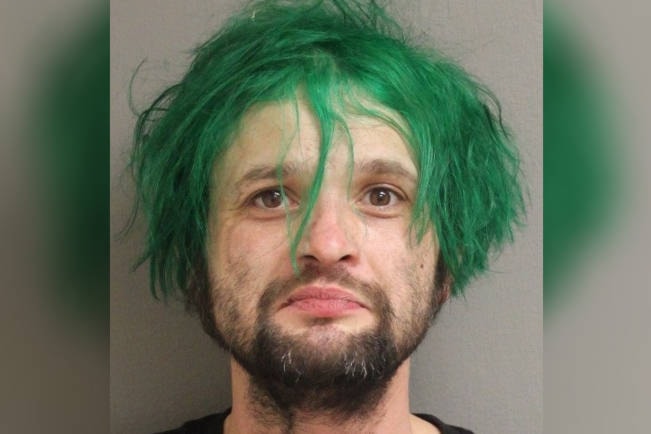 21363837_web1_200429-NBU-suspect-with-green-hair_1