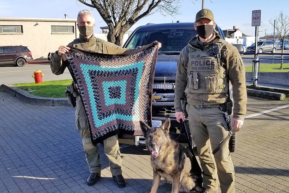 27524449_web1_211214-NBU-Blankets-crocheted-for-police-dogs_1