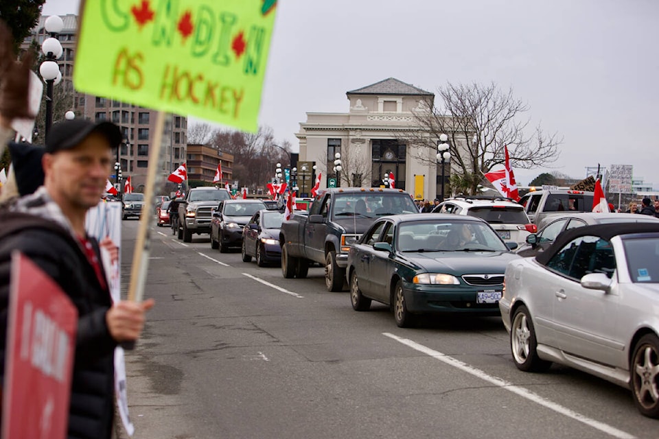 Vehicles drove through downtown Victoria on their way to the B.C. Legislature Saturday afternoon for a demonstration against pandemic-related mandates in front of the B.C. Legislature. (Justin Samanski-Langille/News Staff)