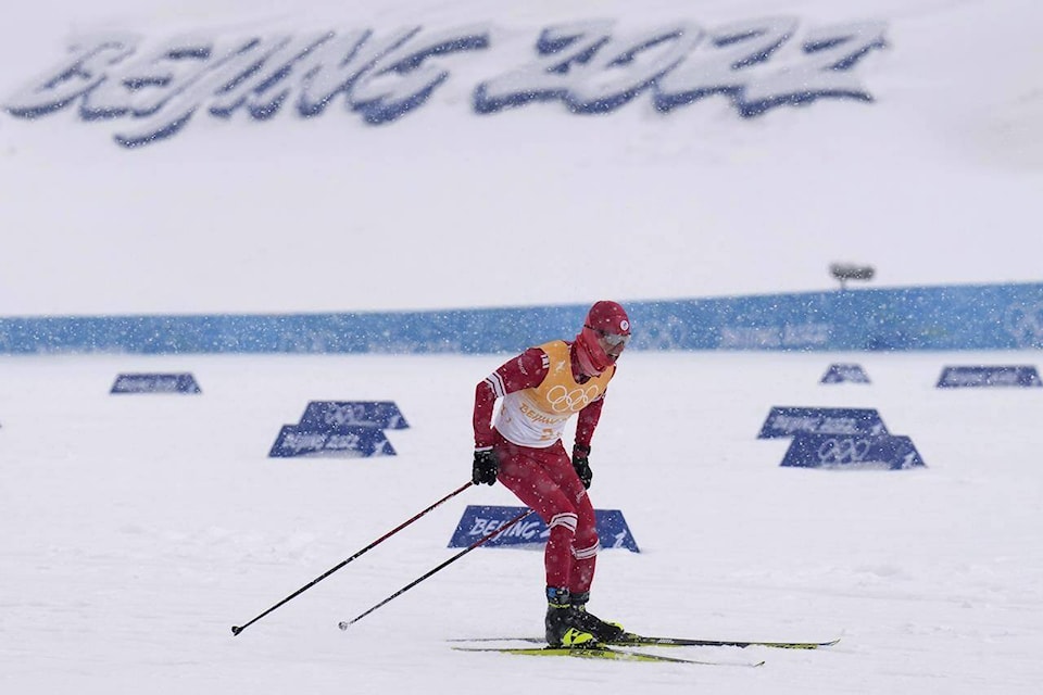 Denis Spitsov, of the Russian Olympic Committee, competes during the men’s 4 x 10km relay cross-country skiing competition at the 2022 Winter Olympics, Sunday, Feb. 13, 2022, in Zhangjiakou, China. (AP Photo/Alessandra Tarantino)