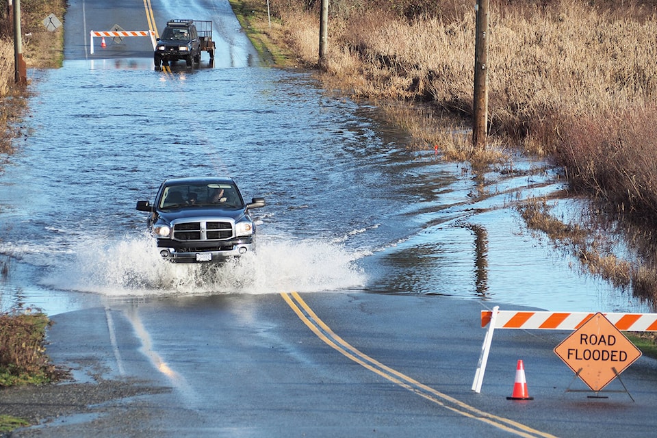 28212405_web1_220218-NBU-MacMillan-Road-flood-repairs-_1