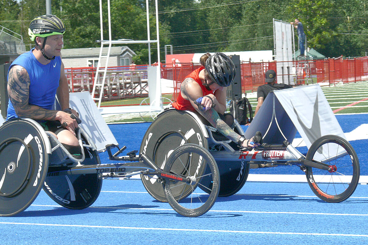 Wheelchair racers were practicing on the McLeod Stadium track in Langley on Wednesday, June 22, as athletes assembled for the start of the 2022 Bell Canadian Track and Field Championships. (Dan Ferguson/Langley Advance Times)