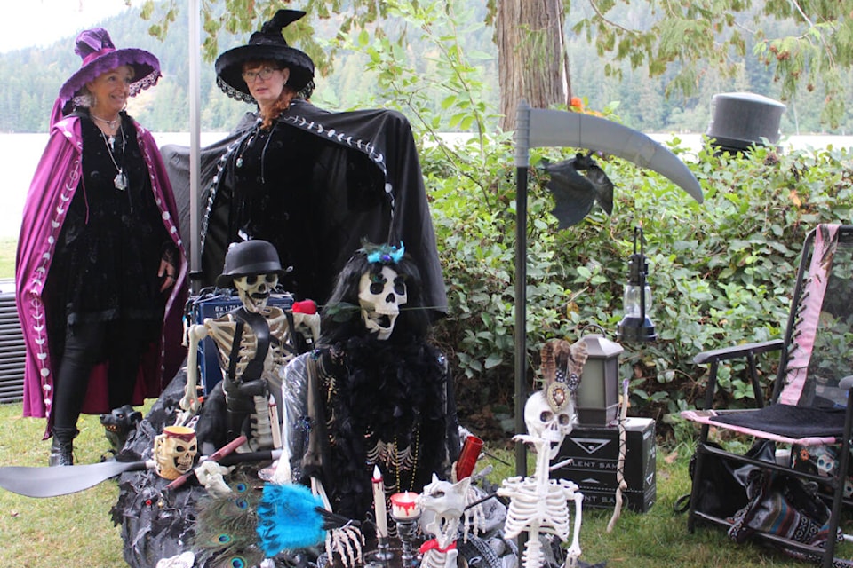 Colleen Patchett and Trish Johnston created a spooky display at the Vancouver Island University Students’ Union Witch Paddle at Westwood Lake on Saturday, Oct. 29. The event raised funds for Loaves and Fishes Community Food Bank and Nanaimo Foodshare Society. (Karl Yu/News Bulletin)