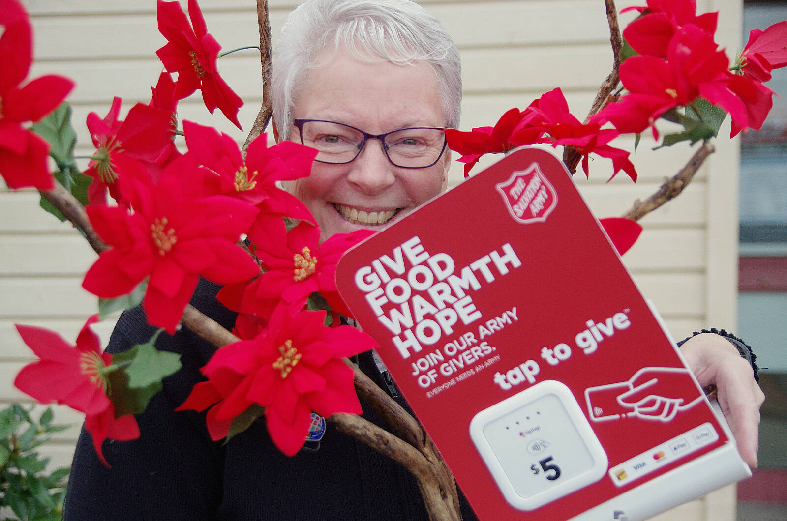 Salvation Army volunteers jingle bells in Nanaimo as part of Christmas