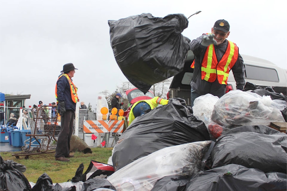 Members of Rotary Clubs in Nanaimo and Lantzville and the public tossed trash during an Earth Day cleanup event across Nanaimo on April 22. Pictured here, Keith Moores at the visitors’ centre on Northfield Road. (Karl Yu/News Bulletin)