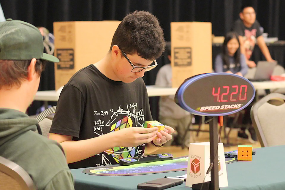 Jose Rodriguez, of Victoria, competes in the 3x3x3 classic cube division Sunday, Aug. 18, at Speedcubing Canada's B.C. championships at Nanaimo's Beban Park Social Centre.