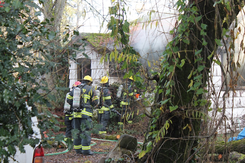 Nanaimo Fire Rescue crews extinguished a house fire on Mill Street. (Jessica Durling/ News Bulletin)