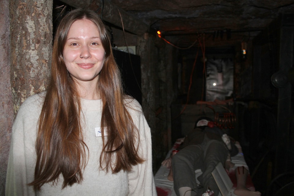 Autumn Brown with the Nanaimo Museum is hard at work with helping Dr. Frankenstein set up his lair. (Jessica Durling/News Bulletin)