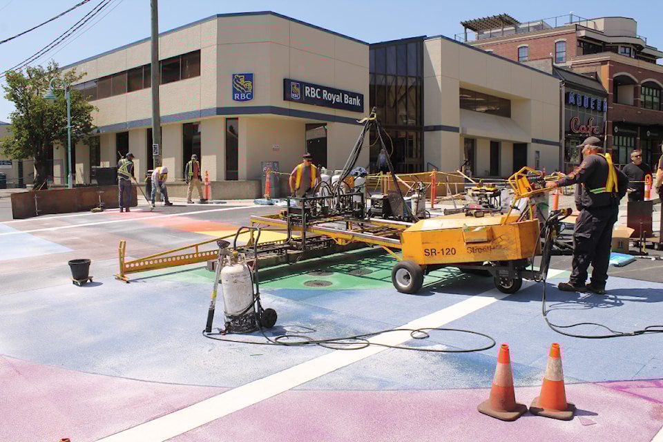 A radiant heater warms thermoplastic tiles up to 182 degrees celsius to melt it to the road. (Jessica Durling/ News Bulletin)