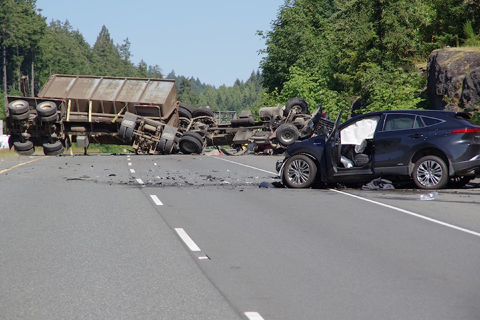 The northbound lanes of the Nanaimo Parkway are closed south of Fifth Street and College Drive after a crash involving a semi truck and another vehicle. 