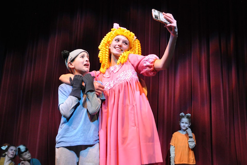 Goldilocks, played by Cetonaya Sammartino, forces a selfie with a raccoon played by Asher Snyder. A very Nelson take on Goldilocks and the Three Bears opens Thursday at The Capitol Theatre.